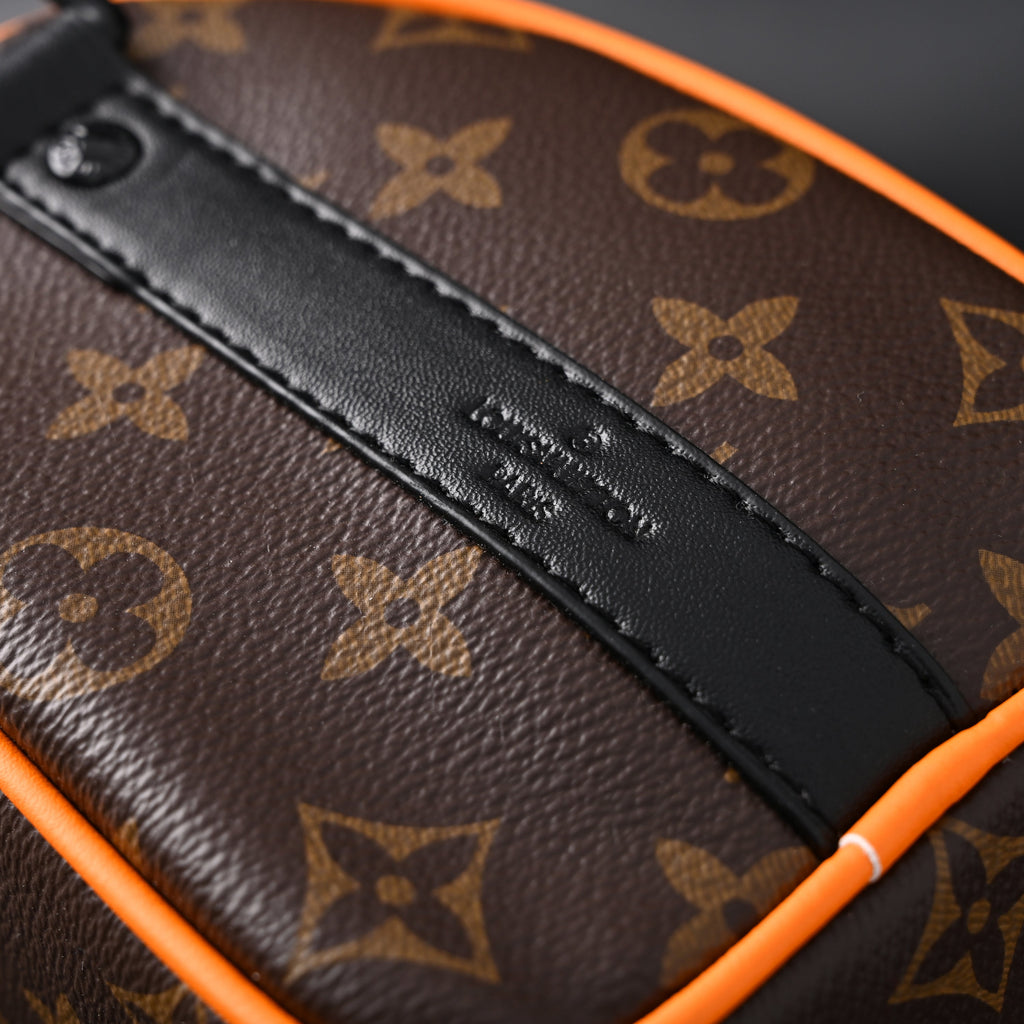 Louis Vuitton Keepall Bandoulière 50 – Monogram Canvas with Neon Orange Trim