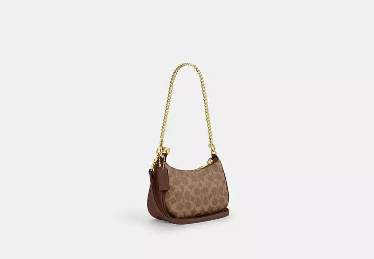 Teri Mini Crossbody Bag In Signature Canvas